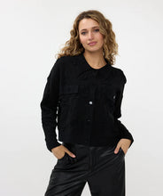 Load image into Gallery viewer, Elevate your wardrobe with the exquisite Benta cardigan. This hip-length cardigan is a perfect blend of elegance and comfort, designed to add a touch of sophistication to any outfit. The cardigan features a unique textured fabric adorned with delicate 3D flowers, creating a stunning visual appeal. Snap buttons in the same color at the front provide a secure and stylish closure, making it easy to wear and remove.