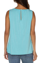Load image into Gallery viewer, This elevated sleeveless top can be worn alone or under your favorite blazer. Elegant and classy with a versatile and minimalist silhouette.This elevated sleeveless top can be worn alone or under your favorite blazer, jacket or cardigan. This sleeveless top is elegant and classy with a versatile and minimalist silhouette. The color is bright and bold.
