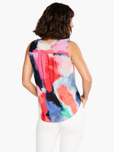 Load image into Gallery viewer, An easy, sleeveless top for adding a splash of color. Pair it with denim or elegant neutrals to instantly make your everyday outfits pop. Just as comfortable as it is striking thanks to its super soft construction and drapey feel. With a slight shirt tail effect for added femininity and contrast patterning along the V-neck collar. Colors - Pink multi; Pinks, coral, blues, greens. Easy fit. V-neck. Sleeveless. One button closure.