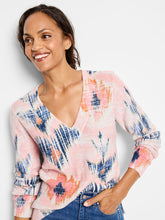 Load image into Gallery viewer, This chic elevated sweater is an ideal upgrade for your daily attire. Its abstract floral print and waffle stitch texture add a contemporary and fashionable flair, while the cozy cotton blend ensures comfort and confidence throughout the day. Combine it with your go-to jeans for a casual yet stylish ensemble suitable for any season. It features long sleeves, a broad V-neck collar, and a comfortable midweight design. Consciously crafted from fully-fashioned knitwear, it also promotes textile waste reduction.