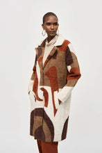 Load image into Gallery viewer, Add a touch of refinement to your wardrobe with this feather yarn sweater coat showcasing an avant-garde color-block design. Embrace classic luxury with a notched collar, straight long sleeves, and handy patch pockets. Experience both comfort and sophistication with this sleek piece, secured by inside snap closures.