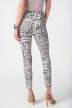 Load image into Gallery viewer, Constructed from premium millennium fabric, these pull-on pants boast a sophisticated slim fit and are adorned with a striking abstract print. The refined faux fly and practical side pockets add to the overall polished aesthetic. Color- Vanilla/Multi. Millennium fabric. Waistband with loops. Side pockets. Fake fly. Unlined.