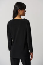Load image into Gallery viewer, The Ronan Rhinestone V-Neck Top by Joseph Ribkoff is the perfect combination of elegance and contemporary style. This boxy top features a black silky knit and abstract patterned fabric in a unique mélange for a one-of-a-kind look. Finishing touches include a V-neckline with rhinestone trim and long straight sleeves with side slits. Create a unique style for any occasion. Color- Black, white, red, brown, blue, orange. Silky knit fabric. V-neckline. Long straight sleeves.