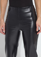 Load image into Gallery viewer, Close-up of back wicker textured faux leather pant and black top worn by model against a white background.