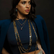 Load image into Gallery viewer, Introducing the Lumi necklace, a dazzling and versatile piece adorned with a high-quality pear-shaped stone in the middle. This antique gold-plated necklace features a 14” length with a 3” extension. Handcrafted in Canada. Color- Gold and amethyst. Premium crystals. Tear drop in amethyst. Gold chain. Length- 14 inches with 3-inch extension.