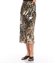 Load image into Gallery viewer, This midi skirt flaunts an eye-catching animal print and offers a slim silhouette that moves gracefully. Its pull-on waistband provides effortless wearing. Pairs beautifully with a solid black top or our Color -Shadow Animal Print Side pockets. Lined. Fabric - 100% Viscose. Care- Dry clean.
