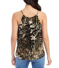 Load image into Gallery viewer, Constructed from georgette fabric, this stylish top is adorned with an animal print and boasts a halter neckline, sleeveless design, spaghetti straps, and a loose fit. This versatile piece is sure to add a fashionable touch to any outfit, from jeans to skirts, and is perfect for layering beneath a jacket.