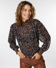 Load image into Gallery viewer, This brown, smocked long sleeve blouse, featuring swirling circles known as "Animal Steps," is a fashionable piece that can be dressed up or down depending on the occasion. Its unique design offers a chic and stylish look. Color-Brown, black, brown. Button back closure. Smocked neck and sleeves. Slightly sheer. Suggest wearing a black bra or black cami underneath.