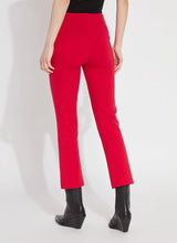 Load image into Gallery viewer, The Ankle Elysse, with its shorter 27.5-inch inseam, is an ideal fit-and-flare pant for shorter women. Crafted from 4-way stretch Ponte fabric, it gracefully contours the hips and thighs, then flares at the leg. Featuring a concealed patented waistband and front pintucks, its stunning deep red hue is sure to make a statement.
