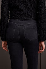 Load image into Gallery viewer, Elevate your style with glamorous gemstone accents on the striking black Audrey Pull-On Slim Jean. Crafted for the contemporary woman, these jeans boast a smooth pull-on design, free from zippers or buttons, for a seamless and flattering silhouette. The slim-leg cut accentuates your figure, offering a flexible and chic option for your clothing collection