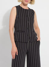 Load image into Gallery viewer, Model wearing a black pinstripe sleeveless vest and matching pants on a white background.