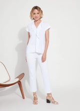 Load image into Gallery viewer, Discover the perfect fit for women with a shorter stature with our Ankle Denim Baby Bootcut - a stylish pant featuring a 27-inch length and slight leg flare. Our pants are made from 4-way stretch Knit Denim and offer a concealed patented waistband, back patch pockets with metal grommets and anatomical seaming for a flattering and comfortable fit. The Ankle Denim Baby Bootcut jean sculpts the body with its precise hip and thigh coverage, leading to an elegant open bootcut leg.