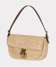 Load image into Gallery viewer, Woven handbag with a brown strap and gold buckle against a light gray background.
