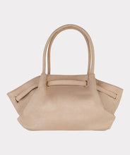 Load image into Gallery viewer, Cappuccino colored suede bag against a white background.