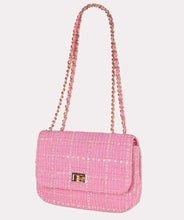 Load image into Gallery viewer, The Esqualo Tweed Bag features a twist lock, zippered pocket on the back, and elegant gold detailing on a cute rose pink tweed exterior. This timeless accessory seamlessly enhances all types of outfits, from casual to formal. The fashionable design is complemented by practical functionality, making it suitable for any occasion.