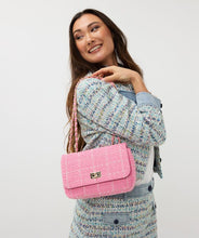 Load image into Gallery viewer, The Esqualo Tweed Bag features a twist lock, zippered pocket on the back, and elegant gold detailing on a cute rose pink tweed exterior. This timeless accessory seamlessly enhances all types of outfits, from casual to formal. The fashionable design is complemented by practical functionality, making it suitable for any occasion.