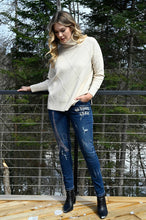 Load image into Gallery viewer, The Frank Lyman jean, also known as the "Brooklyn Be Brave & Free Sparkle Jean," is a dazzling addition to any wardrobe. These jeans feature sparkling details with phrases like "Be Brave, Be Free" shining on one side, and the Eiffel Tower along with the word "Paris" on both sides. Made from a blend of cotton, polyester, rayon, and elastane, they offer stretchable comfort and a stylish edge.