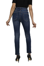 Load image into Gallery viewer, The Frank Lyman jean, also known as the "Brooklyn Be Brave & Free Sparkle Jean," is a dazzling addition to any wardrobe. These jeans feature sparkling details with phrases like "Be Brave, Be Free" shining on one side, and the Eiffel Tower along with the word "Paris" on both sides. Made from a blend of cotton, polyester, rayon, and elastane, they offer stretchable comfort and a stylish edge.