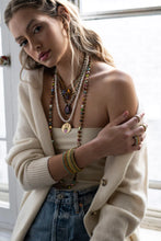 Load image into Gallery viewer, Show off your individuality with the Be Free Necklace! Made of gold plated brass, polished pearls, and colorful enamel, this fashionable piece measures 16" with a 3" extension and adds a touch of flair to any outfit. Crafted in Canada, this necklace is the perfect way to express yourself! Color- Gold, white, red, orange, yellow, pink, blue. Gold plated brass. Polished pearls. Length- 16 inch with 3 inch extension.