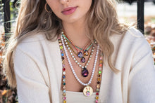 Load image into Gallery viewer, Show off your individuality with the Be Free Necklace! Made of gold plated brass, polished pearls, and colorful enamel, this fashionable piece measures 16" with a 3" extension and adds a touch of flair to any outfit. Crafted in Canada, this necklace is the perfect way to express yourself! Color- Gold, white, red, orange, yellow, pink, blue. Gold plated brass. Polished pearls. Length- 16 inch with 3 inch extension.