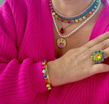 Load image into Gallery viewer, Show off your individuality with the Be Free Necklace! Made of gold plated brass, polished pearls, and colorful enamel, this fashionable piece measures 16" with a 3" extension and adds a touch of flair to any outfit. Crafted in Canada, this necklace is the perfect way to express yourself! Color- Gold, white, red, orange, yellow, pink, blue. Gold plated brass. Polished pearls. Length- 16 inch with 3 inch extension.