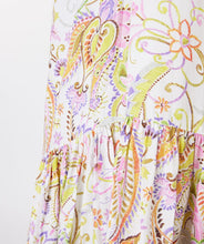 Load image into Gallery viewer, Gorgeous eye-catching spring/summer colors just pop on this stunning dress by EsQualo. With its feminine design, you will feel so pretty when you wear this beauty to luncheons with friends, garden/pool parties or evening events. Colors- Shades of greens, purples, orange, touch of brown on a white background. Whimsical floral print. V-Neck. Drop waist. Three-quarter sleeves. Fabric -100% Viscose.