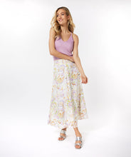 Load image into Gallery viewer, Gorgeous eye-catching spring/summer colors just pop on this stunning skirt by EsQualo. With its feminine design, you will feel so pretty when you wear this beauty to luncheons with friends, garden/pool parties or evening events. Colors- Shades of greens, purples, orange, touch of brown on a white background. Whimsical floral print. Fully lined. Side zipper closure. Back elastic waist. Fabric -100% Viscose.