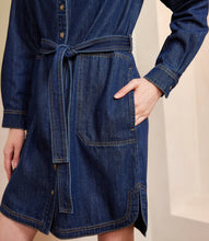 Load image into Gallery viewer, Close-up of blue denim dress with belt against a neutral background.