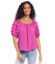 Load image into Gallery viewer, Add a pop of vibrant color to your wardrobe with the Karen Kane Becca Berry Pleat Sleeve Top. Featuring pleated tiers on the sleeves, a shirred neckline, and a flattering shirttail hem, this peasant-style top offers a charmingly feminine aesthetic. Crafted from 100% polyester heavy moss crepe, it’s lightweight and perfect for both casual and dressy occasions. Designed for comfort and style, this top is a versatile must-have for any season.