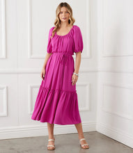 Load image into Gallery viewer, Featuring a ruffled tier and tie at the waist for figure-flattering shape, this relaxed peasant-style dress is rendered in a vibrant berry hue. The long silhouette offers an elegant design. Color- Berry. Scoop neck. Side pockets. Tie waist. Fabric - 100% Polyester.