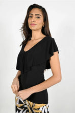 Load image into Gallery viewer, Expertly designed, this top features a flattering silhouette with a V-neckline and a ruffle overlay that drapes beautifully in both the front and back. Its flowy cap sleeves provide a touch of sophistication, while the soft fabric and classic black hue make it versatile for any occasion, whether dressed up or down with denim.