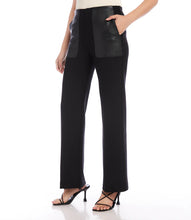 Load image into Gallery viewer, Experience the ultimate combination of style and comfort with the Black Contrast Pocket Pants by Karen Kane. Whether dressing up for the office or aiming for a casual yet chic look, these pants provide a premium feel against your skin. Elevate your next black pant experience with Karen Kane's signature contrast pocket design. Color - Black. Contrast pockets in faux leather. Full length. Straight leg. Elasticized waistband.