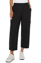 Load image into Gallery viewer, The Black Hi-Rise Cargo Crop Straight Pant by Liverpool Los Angeles have a straight leg design and cargo pockets, with added comfort from the back elastic waistband. Combine with your go-to sneakers for a fashionable appearance. Color- Black. Hi-Rise. Elastic back waistband. Slash side pockets. Back flap pockets with button closure. Cargo side pockets with button closure. Zip-fly with single button closure.