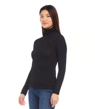 Load image into Gallery viewer, This top is made from a cozy and flexible bubble-textured knit fabric, ideal for everyday wear. The turtleneck design brings an element of elegance to any ensemble.