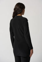Load image into Gallery viewer, This exquisite tunic is crafted from a luxuriously silky knit fabric, complete with a shirt collar and a sash at the hips that creates a flattering fit and flare silhouette. An ideal addition to any wardrobe, this stunning piece pairs perfectly with pants or jeans. Color- Black. Shirt collar. Sash at the hips. Button down. Unlined.