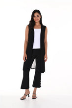 Load image into Gallery viewer, The black above-the-ankle pants are a versatile wardrobe staple, offering endless possibilities for effortless style. The silver rivet embellishments elevate the look of a basic black pant and create an eye-catching silhouette. With their timeless elegance and flattering fit, they seamlessly pair with any top or shoe, making them a go-to choice for both casual and formal occasions.