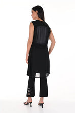 Load image into Gallery viewer, The black above-the-ankle pants are a versatile wardrobe staple, offering endless possibilities for effortless style. The silver rivet embellishments elevate the look of a basic black pant and create an eye-catching silhouette. With their timeless elegance and flattering fit, they seamlessly pair with any top or shoe, making them a go-to choice for both casual and formal occasions.