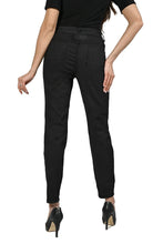 Load image into Gallery viewer, Experience maximum outfit versatility in these innovative two-in-one jeans. The reversible design features a classic animal print on one side and a solid black print on the reverse. This fabulous denim pant is sure to become a wardrobe favorite! Color - Camel and black. Reversible design. Animal print on one side, solid black on the other. Fly front with belt loops. Perfect stretch and recovery. Fabric - 65% cotton. 33% polyester. 2% elastane. Hand wash cold water inside out. Hang to dry.