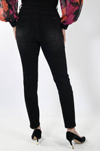 Load image into Gallery viewer, These black straight leg jeans crafted from exceptional denim feature eye-catching hand-painted motifs of bright magenta flowers, which are further accented with sequins and rhinestones for a dazzling finish. Make a bold style statement and stand out from the crowd in these extraordinary jeans. Color- Black and magenta. Slim leg design. Painted floral designs with sequin and rhinestones. Floral designs on front side only. Five functional pockets. Zipper and button closure.