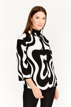 Load image into Gallery viewer, This amazing jacket features a bold abstract print in classic black and white colors. Designed with three quarter sleeves and collarless neck, this modern Frank Lyman design offers a professional and vogue look. Wear it on its own, or over a dress, cardigan, or top for a stylish look This brilliant style is perfect for the office, a social event, or a night out. Color- Black and white. Square button down. No pockets. Abstract print. Three quarter sleeves. Slight stretch fabrication.