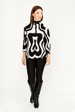 Load image into Gallery viewer, This amazing jacket features a bold abstract print in classic black and white colors. Designed with three quarter sleeves and collarless neck, this modern Frank Lyman design offers a professional and vogue look. Wear it on its own, or over a dress, cardigan, or top for a stylish look This brilliant style is perfect for the office, a social event, or a night out. Color- Black and white. Square button down. No pockets. Abstract print. Three quarter sleeves. Slight stretch fabrication.