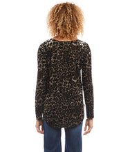 Load image into Gallery viewer, Velvet burnout in a charming leopard design lend both visual and textural interest to this knit top. It's finished with a stylish shirttail hem. With a touch of shimmer, this soft top is an easy way to dress up any look. Color- Black with brown. Long sleeve. Crew neck. Unique dye treatment used; color & design may vary. Fabric - Animal Velvet Burnout: 50% Polyester, 40% Nylon, 10% Spandex. Care-Hand wash cold. Do not bleach. Lay flat to dry. Dry clean if desired.
