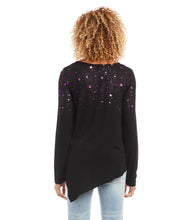 Load image into Gallery viewer, This jersey-knit top is soft to the touch and features a subtle shimmery star print in a vivid purple/magenta hue, lending a touch of charm to your casual weekend wear. Color- Black with purple/magenta stars. Long sleeve. Asymmetric hemline. Scoop neck. Fabric -Rayon Spandex Jersey: 92% Rayon. 8% Spandex.