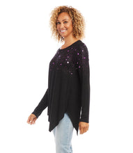 Load image into Gallery viewer, This jersey-knit top is soft to the touch and features a subtle shimmery star print in a vivid purple/magenta hue, lending a touch of charm to your casual weekend wear. Color- Black with purple/magenta stars. Long sleeve. Asymmetric hemline. Scoop neck. Fabric -Rayon Spandex Jersey: 92% Rayon. 8% Spandex.