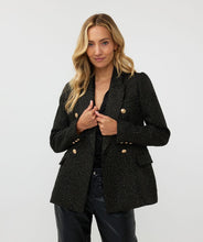 Load image into Gallery viewer, Elevate your style with the Brigida Boucle Blazer Long by EsQualo. The shimmering gold lurex and chic gold buttons add a touch of sophistication to this versatile piece, perfect for any wardrobe. Its classic boucle fabric provides both texture and warmth, while its long silhouette allows for effortless layering.