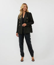 Load image into Gallery viewer, Elevate your style with the Brigida Boucle Blazer Long by EsQualo. The shimmering gold lurex and chic gold buttons add a touch of sophistication to this versatile piece, perfect for any wardrobe. Its classic boucle fabric provides both texture and warmth, while its long silhouette allows for effortless layering.