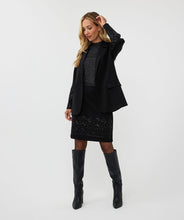 Load image into Gallery viewer, Make a stylish and confident statement with our EsQualo blazer. This timeless black blazer features exquisite beaded detailing on both sleeves, adding a touch of elegance to any outfit. This must-have piece belongs in every fashion-savvy closet and will remain a staple for years to come. Pictured paired with our Senia Skirt Embellishment in Black - EsQualo W2405720. A perfect match!