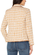 Load image into Gallery viewer, Woman wearing a gold plaid blazer and jeans against a white background.