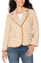 Load image into Gallery viewer, Woman wearing a gold plaid blazer and jeans against a white background.