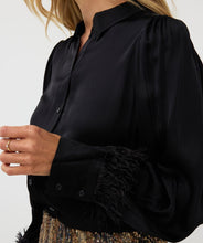 Load image into Gallery viewer, The Briet Blouse Basic Satin Feathers from EsQualo is a sophisticated and stylish top suitable for any event. Crafted with a timeless satin texture and featuring detachable feather cuffs, it can be dressed up for a party-ready look or worn as a versatile piece. Made with 100% viscose, it is both lightweight and comfortable for all-day wear.